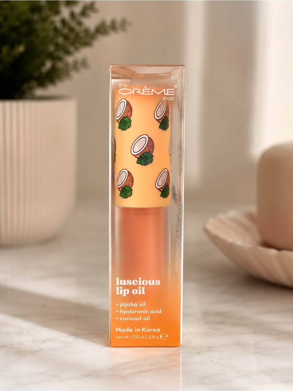 The Crème Shop Luscious Lip Oil in the Coconut Jelly shad
